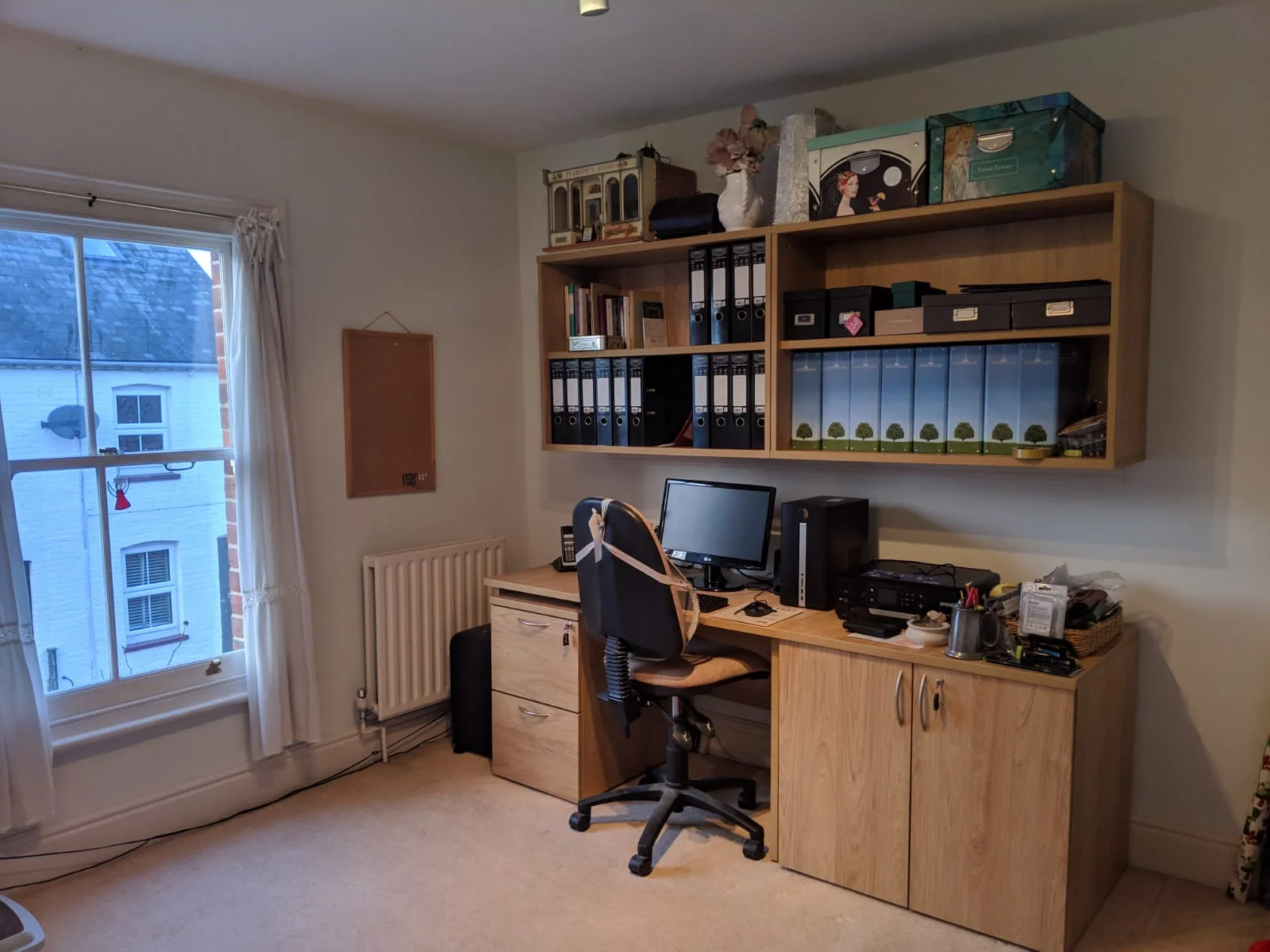 Using Tangent furniture, we refurbished this home office to include a new desk and storage.