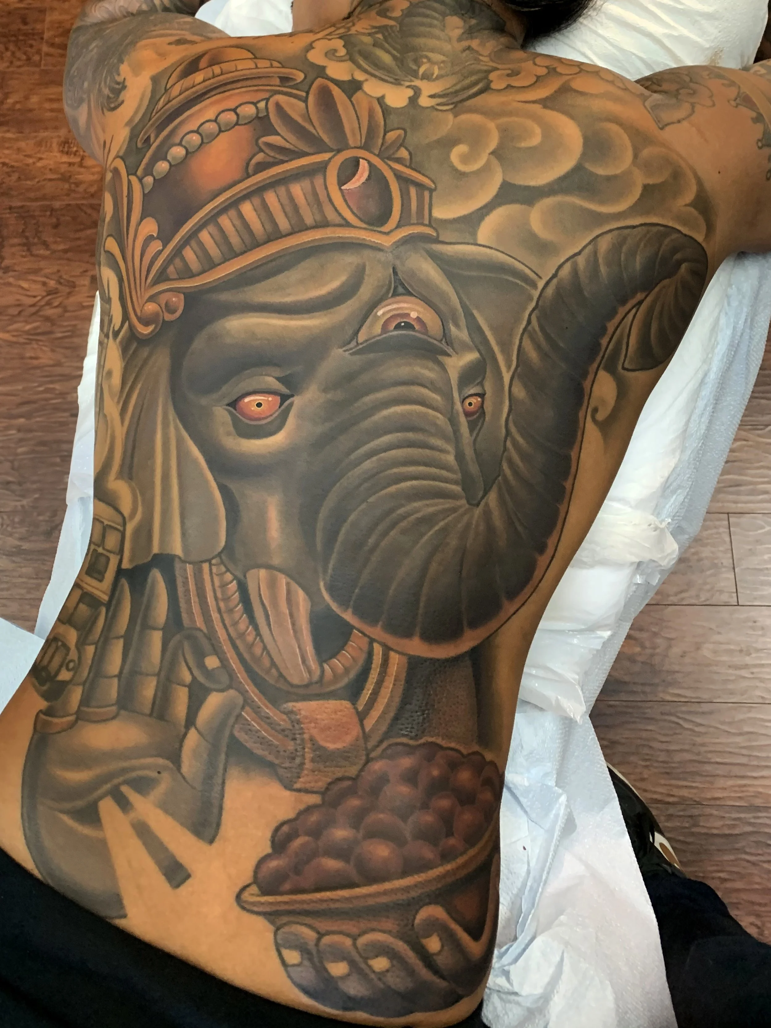 Ganesha back piece tattoo 