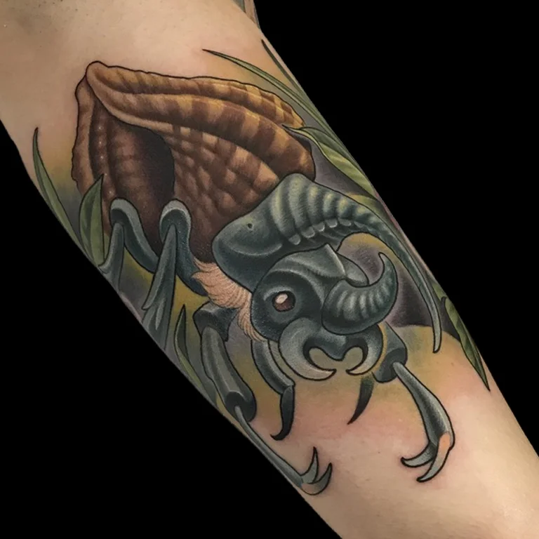 Horned Beetle in Conch Shell Tattoo