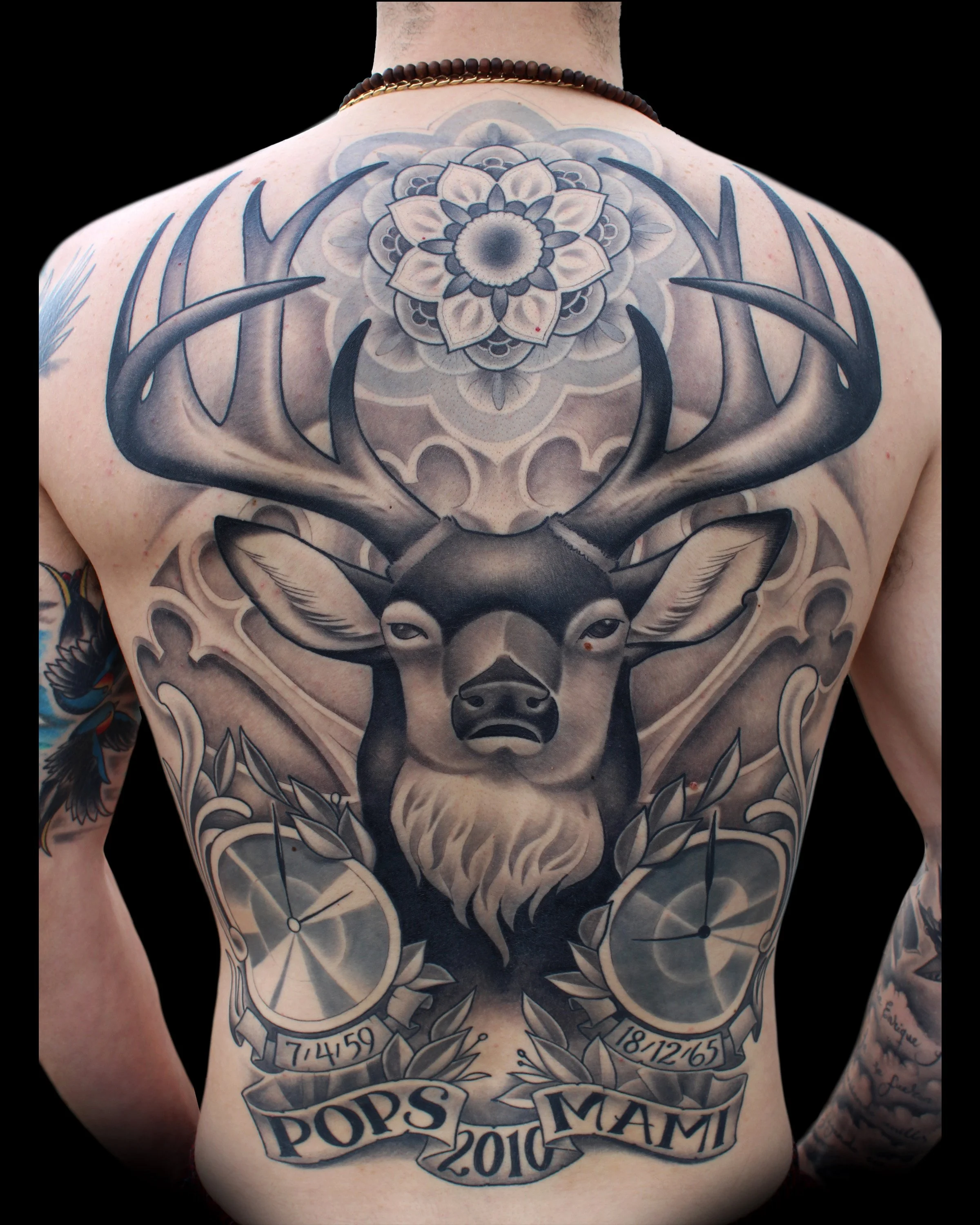 deer mandala back piece tattoo
