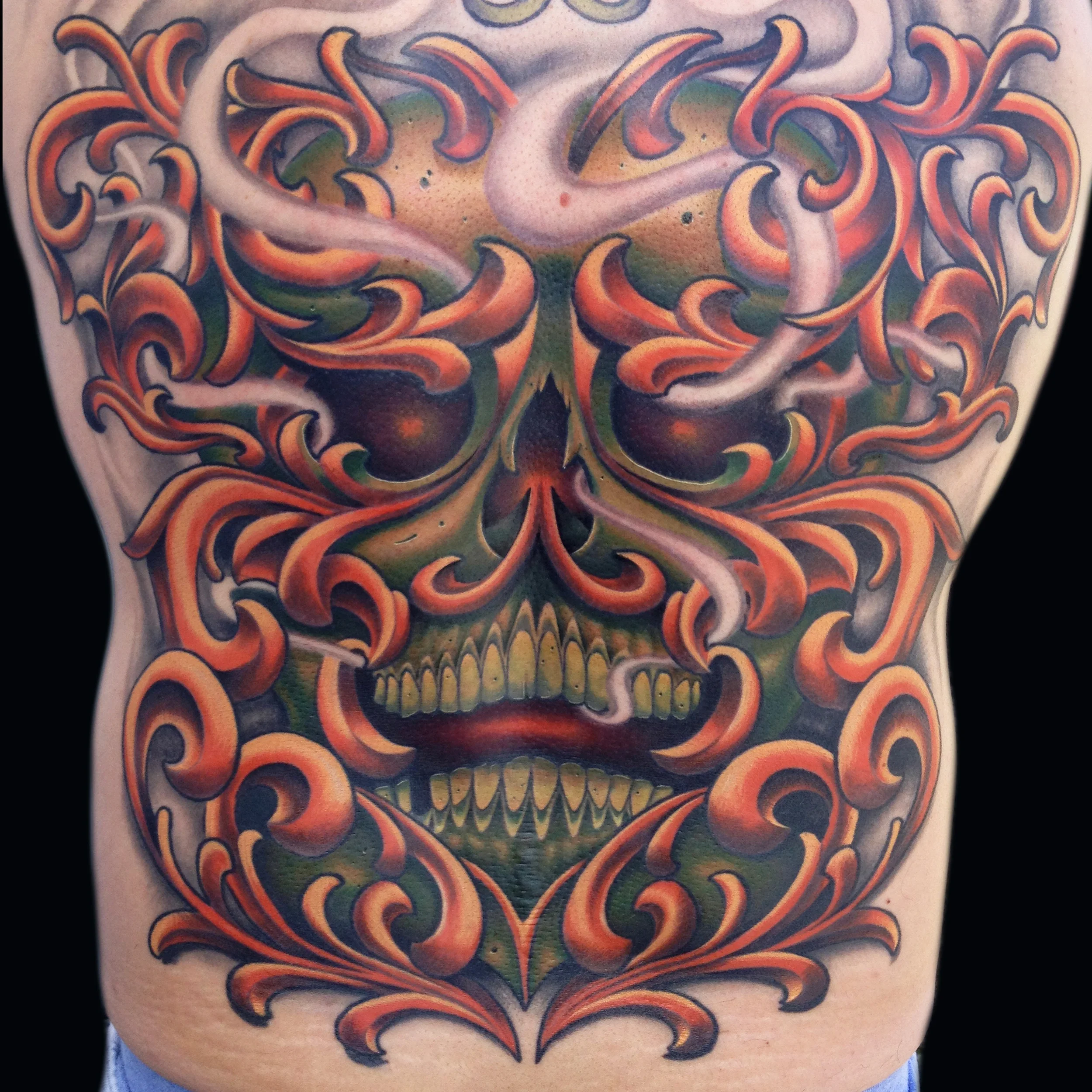 Green Skull and Filigree Backpiece Tattoo