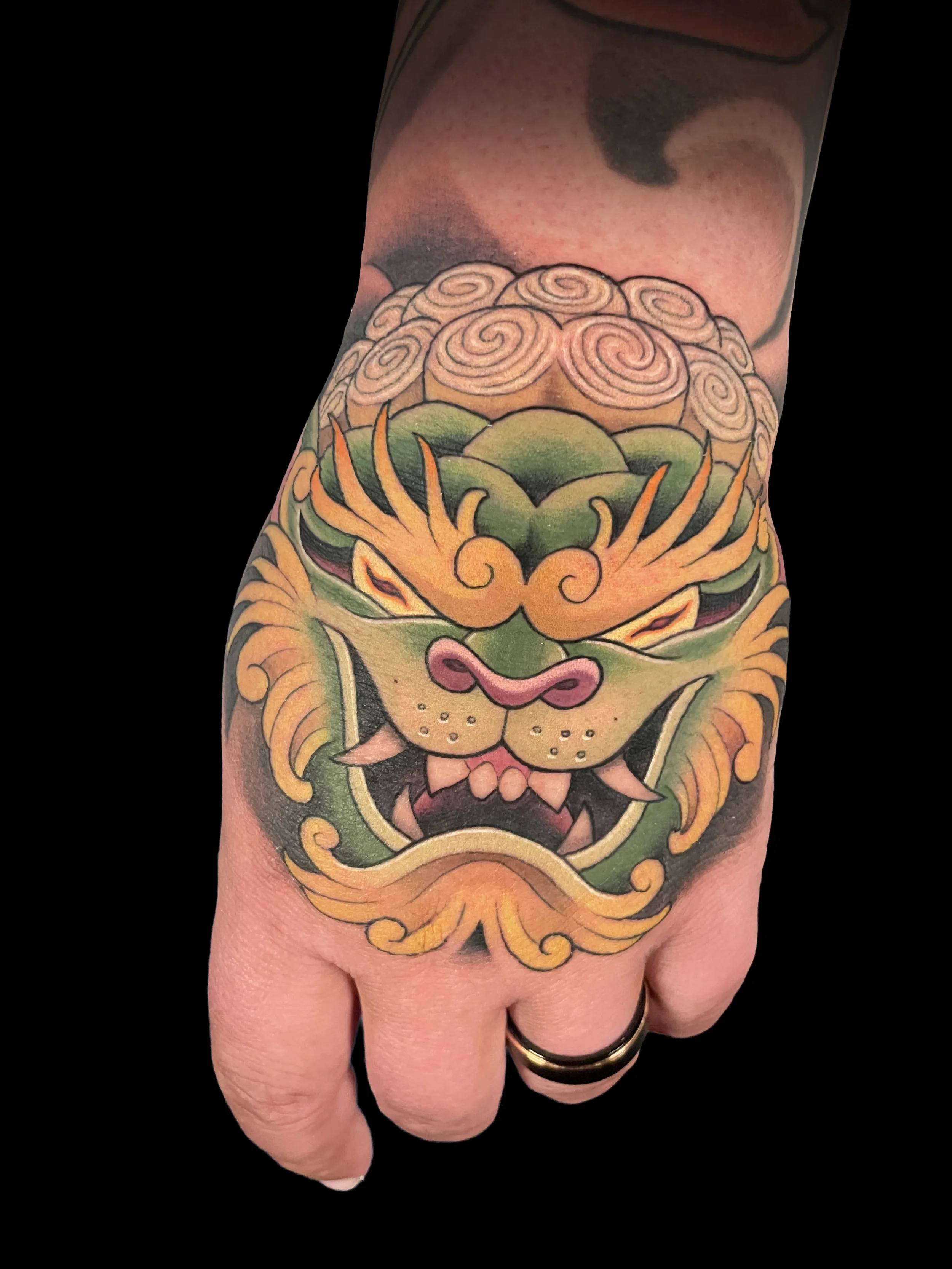 Fu Dog Hand Tattoo
