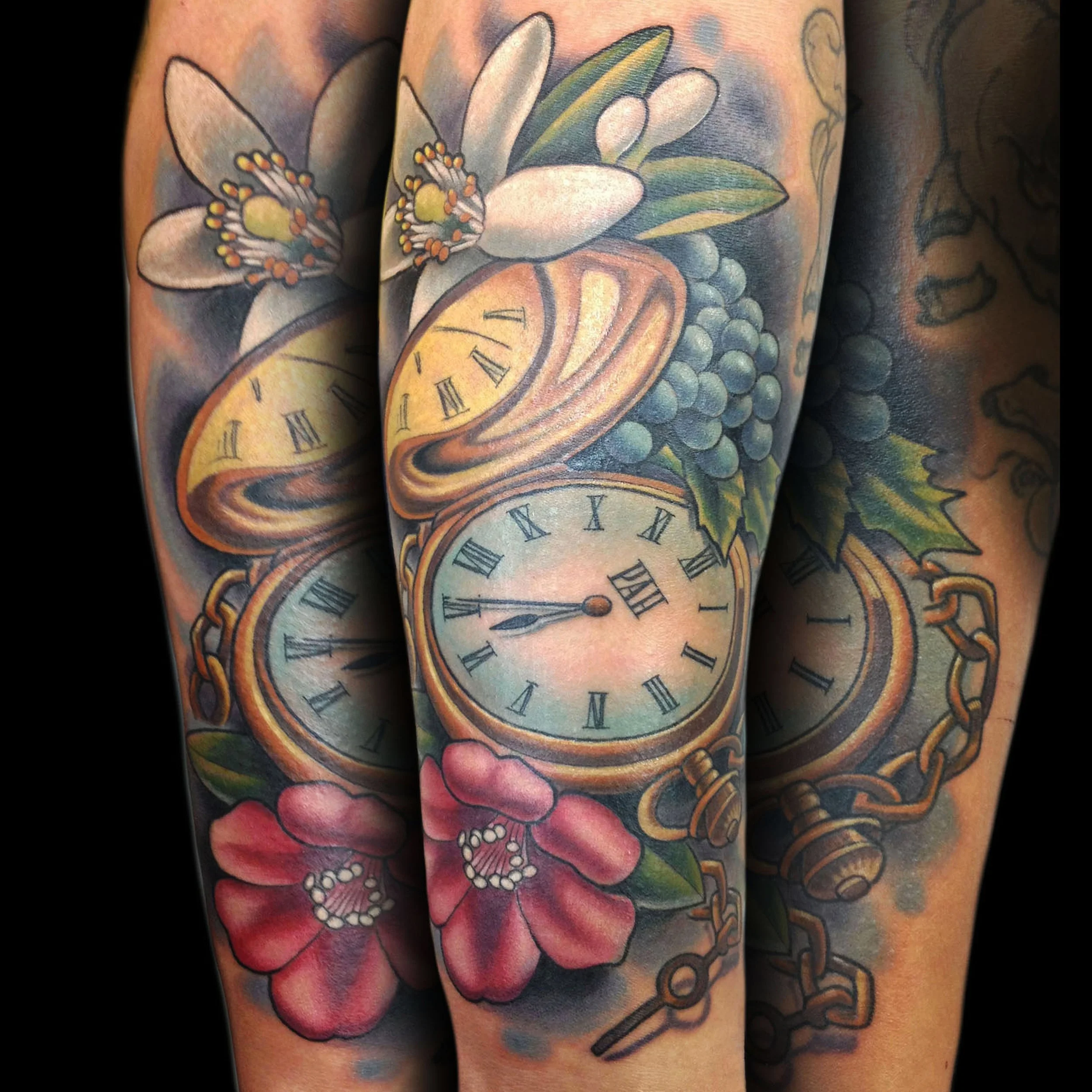 pocket watch and flowers tattoo