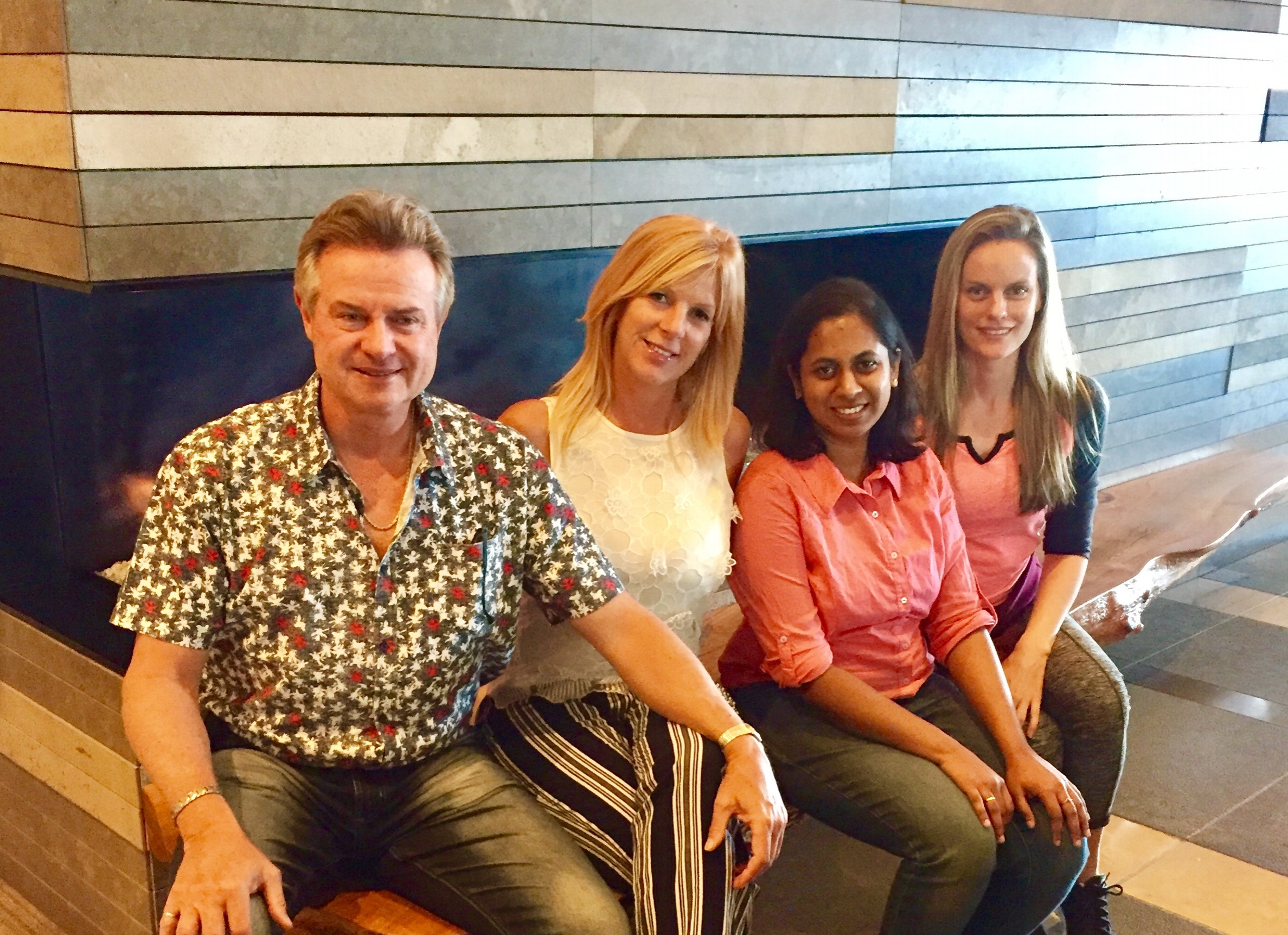Michael, Stacey, Nithya, and Jennifer gathering at a meeting in downtown Seattle on July 5, 2017.
