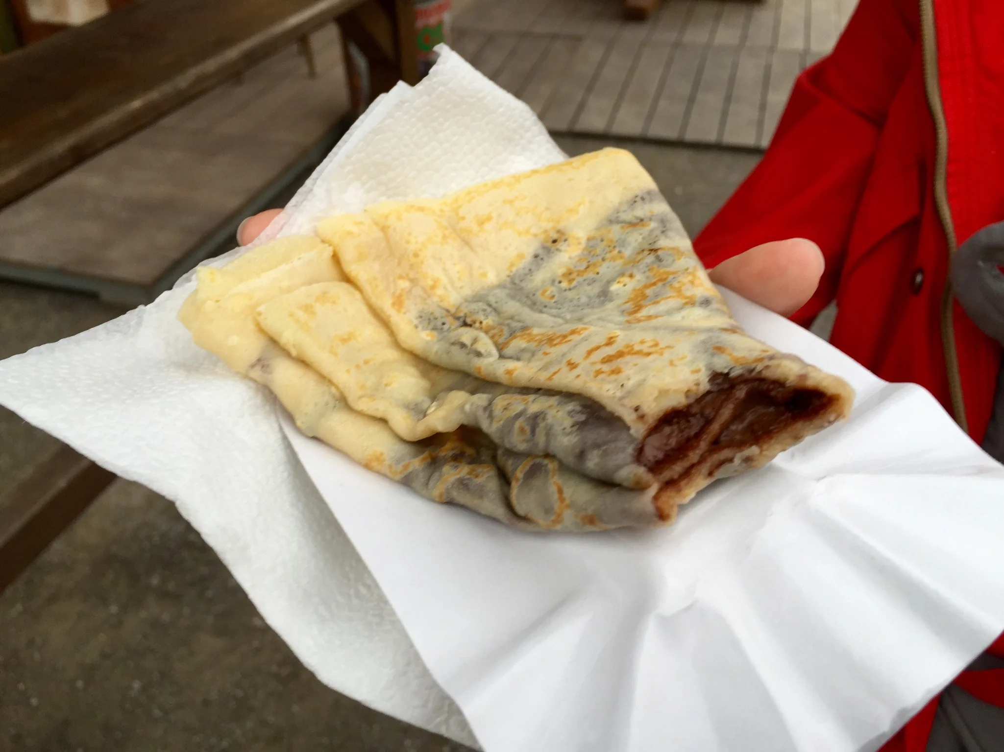 Enjoying a nutella crepe at the fair.