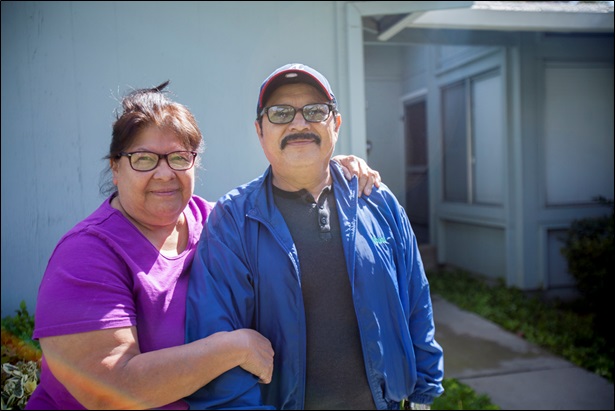 Olivia and Jose Aguilar in front of their niece's home in Modesto. Photo by E. Tammy Kim and Lam Thuy Vo