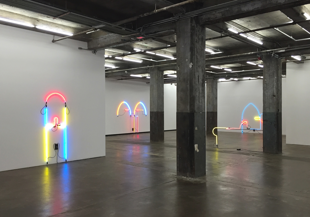 Image caption: Top: Installation view with Syracusa Portal (2015); Bottom: Installation view, Keith Sonnier, "Portals," Maccarone, NY.