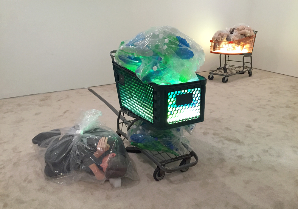 Top: Installation view with Universal Early Retirement (spots #1 & #2) , 2016; Bottom: Installation view, Josh Kline, “Unemployment,” May 3 – June 12, 47 Canal, NY. (Photos: Chris Murtha)