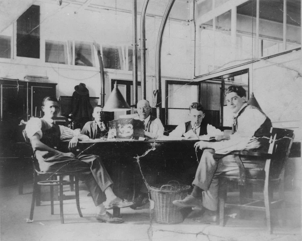 StateLibQld_2_164215_Sub-editor's_room_at_the_Brisbane_Courier_newspaper_office,_Brisbane,_1930.jpg