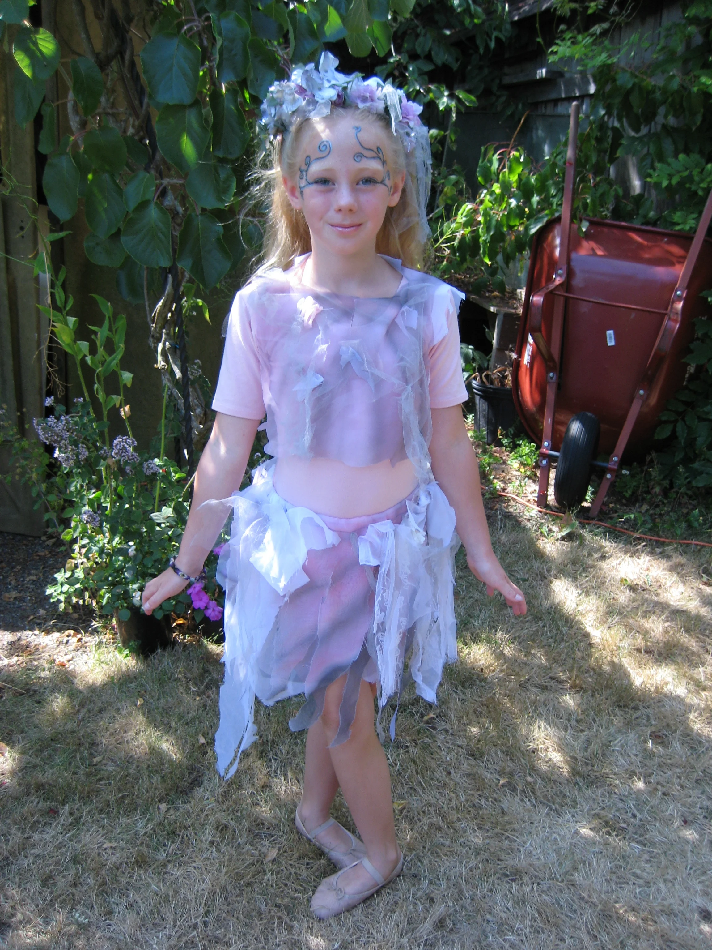 Miranda Cassée as a Fairy in Martha Murphy's backyard