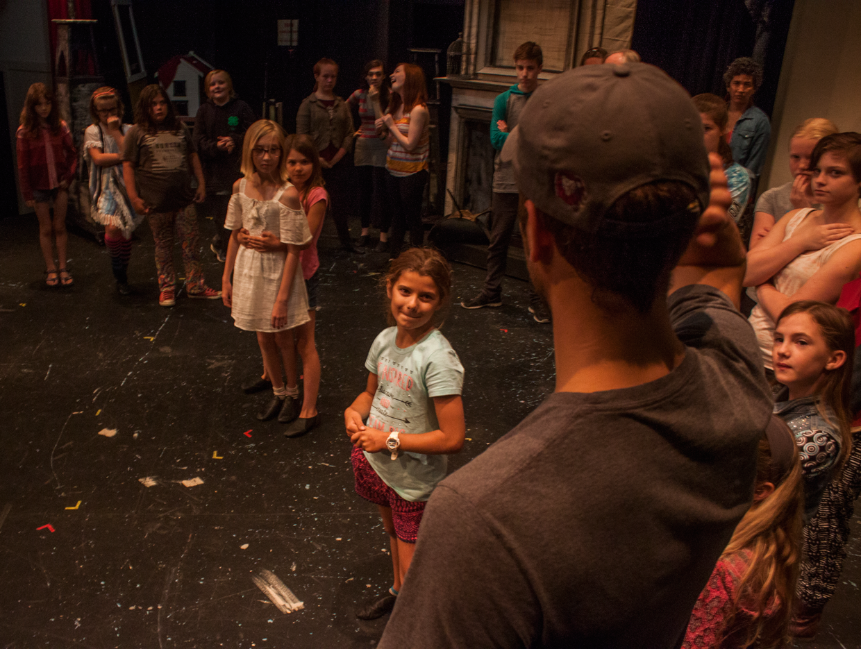 Director Ty Molbak works with Lulu Russo (Chimney Sweep Messenger) during Step in Time choreography. Photo by Kathryn Lynn Morgen
