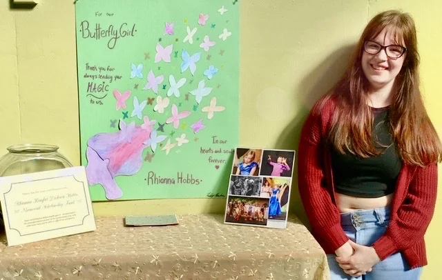 Libby & the Rhianna Wall.jpg