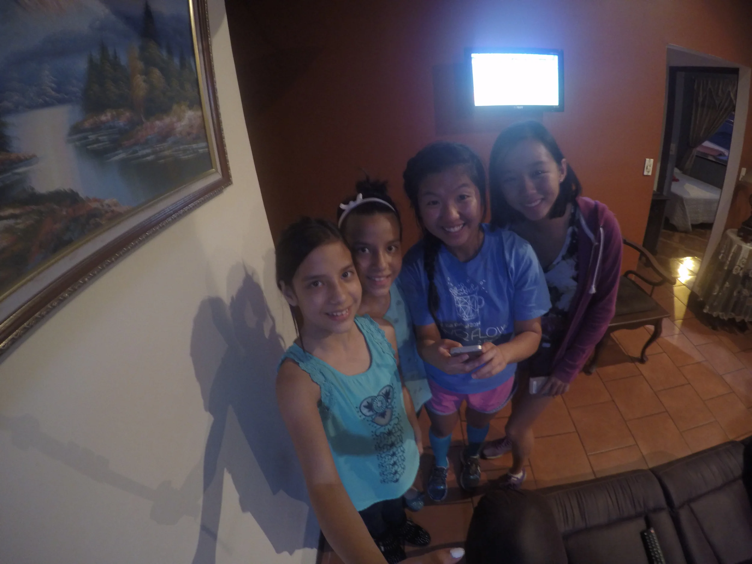 Daniella and Valeria posing for a selfie with Lisa and Karina