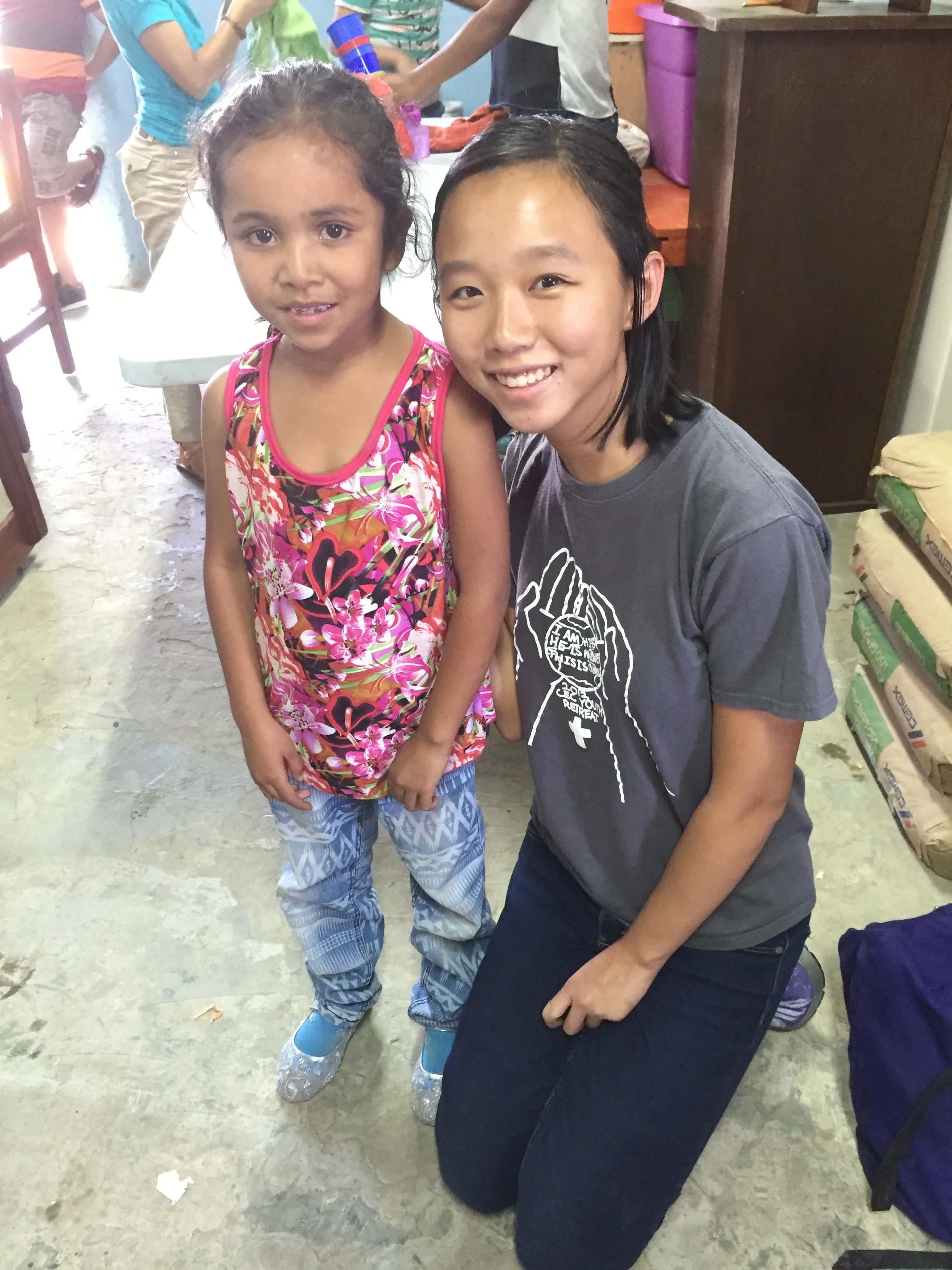Karina snagging a picture with Hennessey