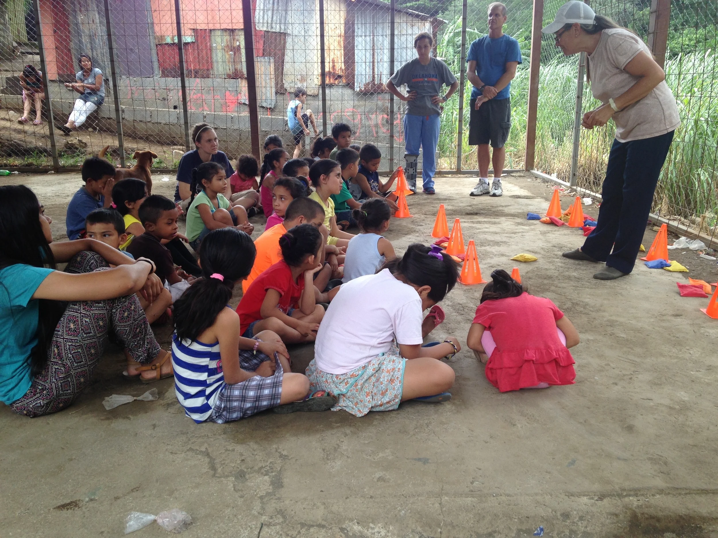 The ministry leader teaching the children about Jesus and the fisherman