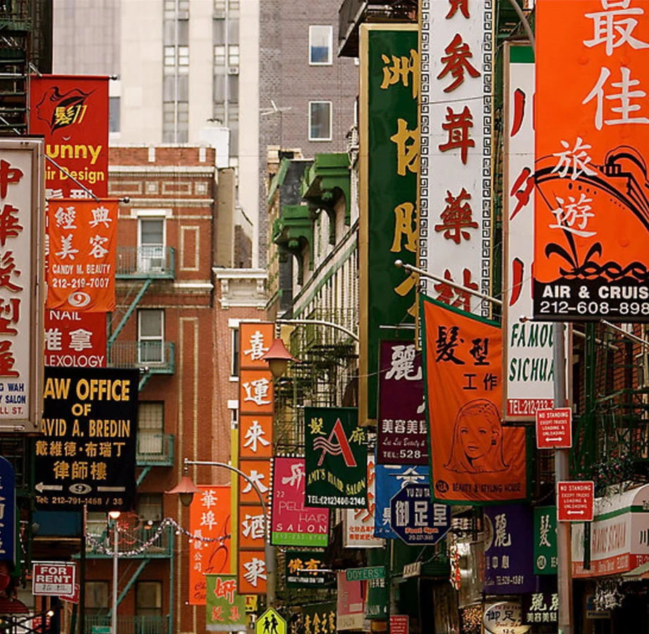 New York City • The colorful banners in Chinatown, home to Buddhist temples, dim-sum restaurants and food vendors.
