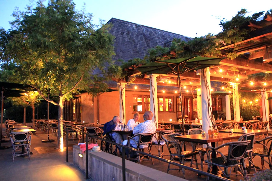   Coppola Winery  &nbsp;•  A dinner outside on the patio overlooking the rows of vines 
