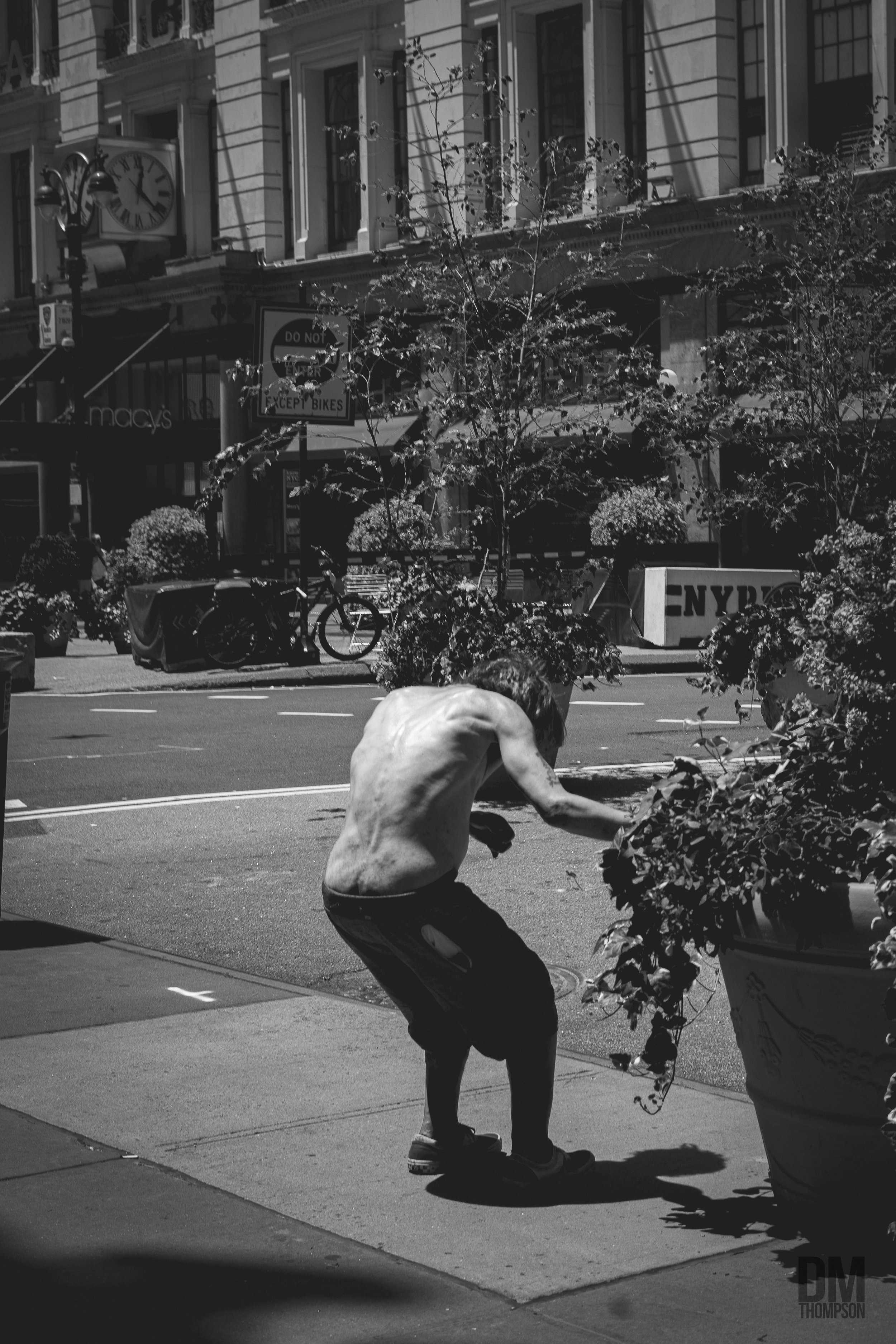 SilentNY-HearldSQ-Leaning-Man.jpg