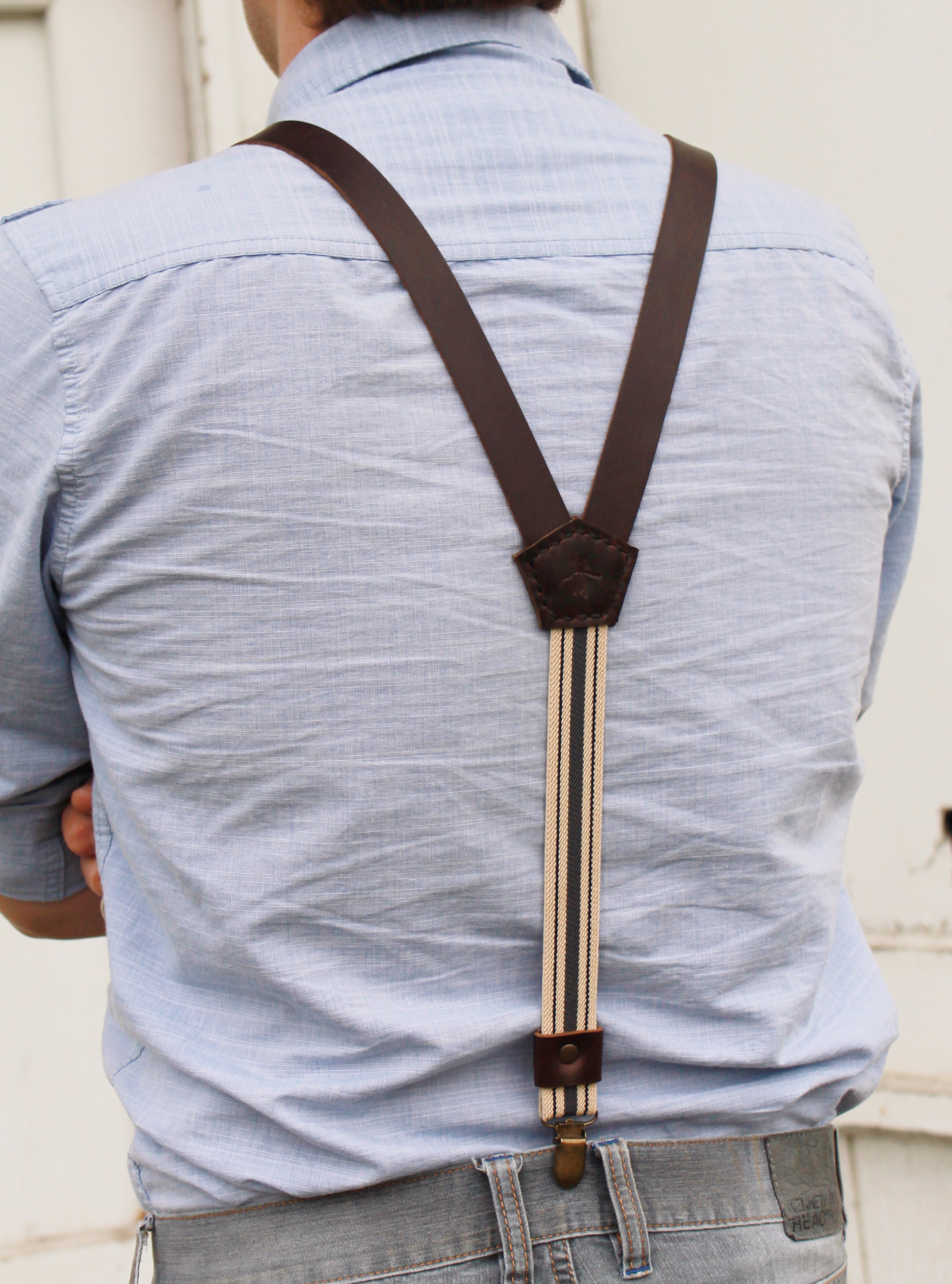 I don't want the yoke angle to be so severe that it causes the front straps to want to spread too much. It's also important to remember that some jeans and pants have the two belt loops in the back while others don't. I can only wear a three strap suspender with this type of jean.