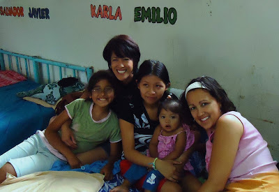 Susan, her daughter Julia and me ministering to a young mom at the government orphanage in El Salvador