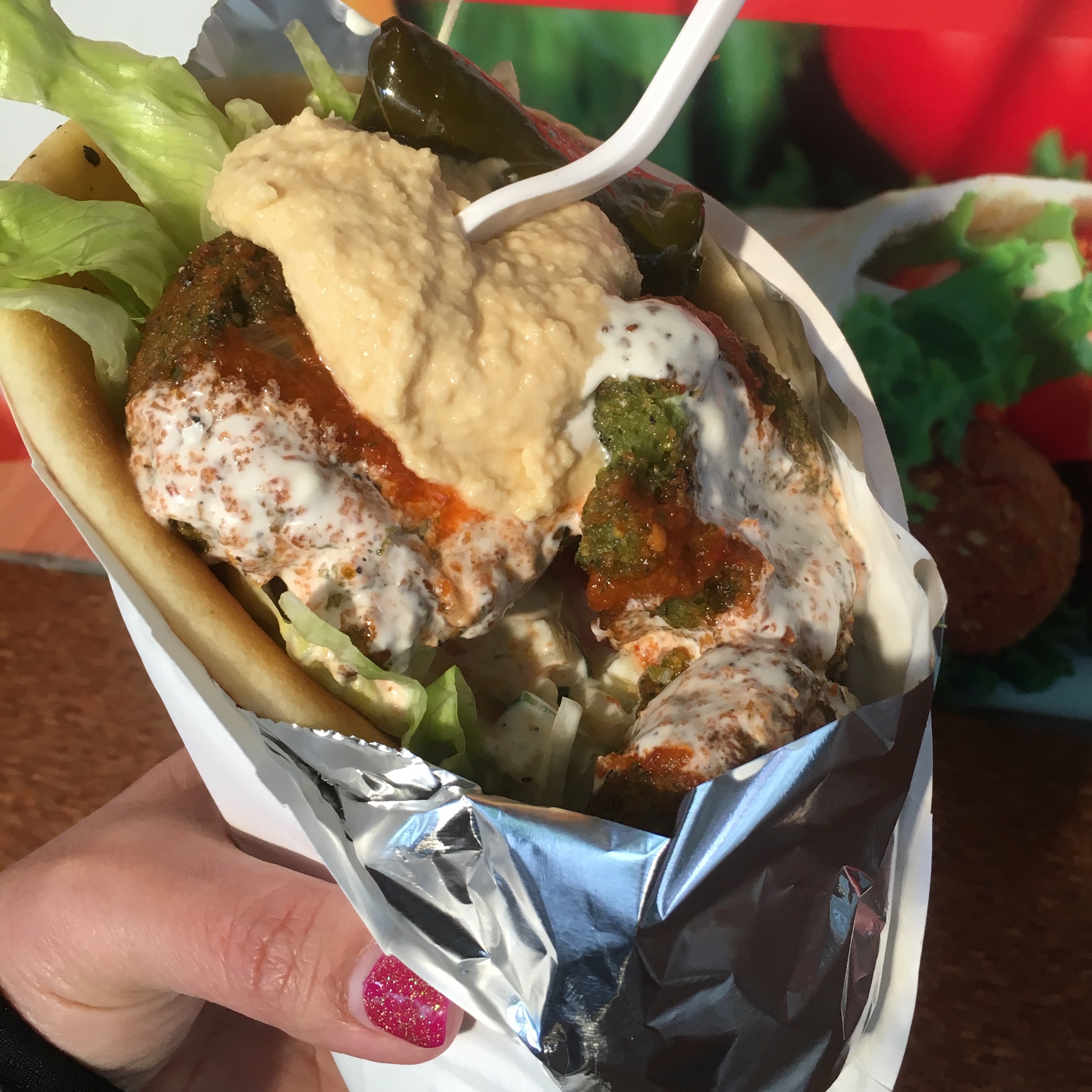 A food cart falafel during lunch with a friend