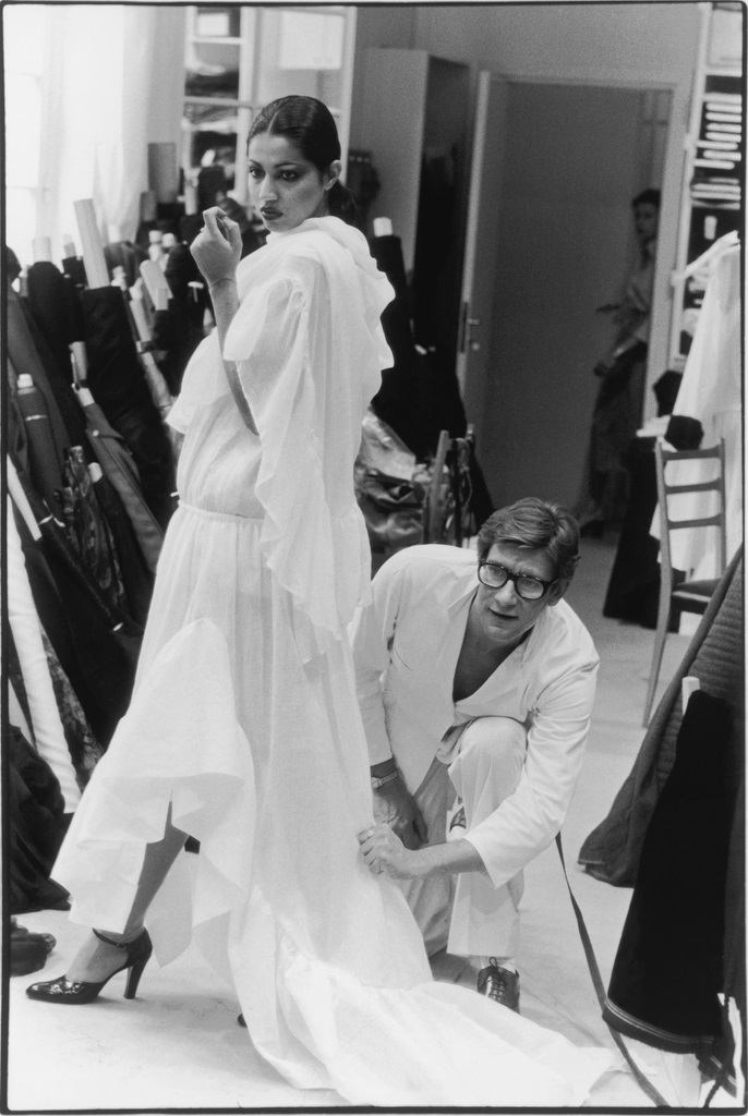 Me getting fitted for my wedding. Just kidding! Yves Saint Laurent in his studio fitting a toile from the Fall-Winter 1977 haute couture collection. Model Kirat. ©André Perlstein. 