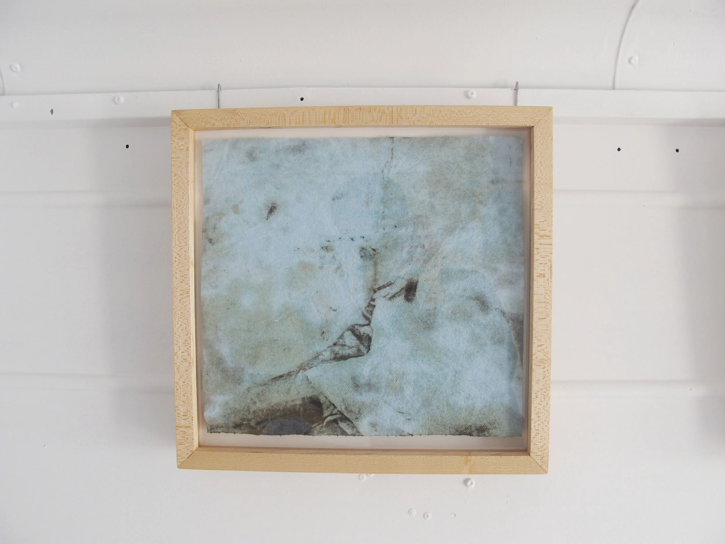poetics of labor (series of 3/6), 2013 blue shop towels, rust, dirt, oil 12.5" x 13''
