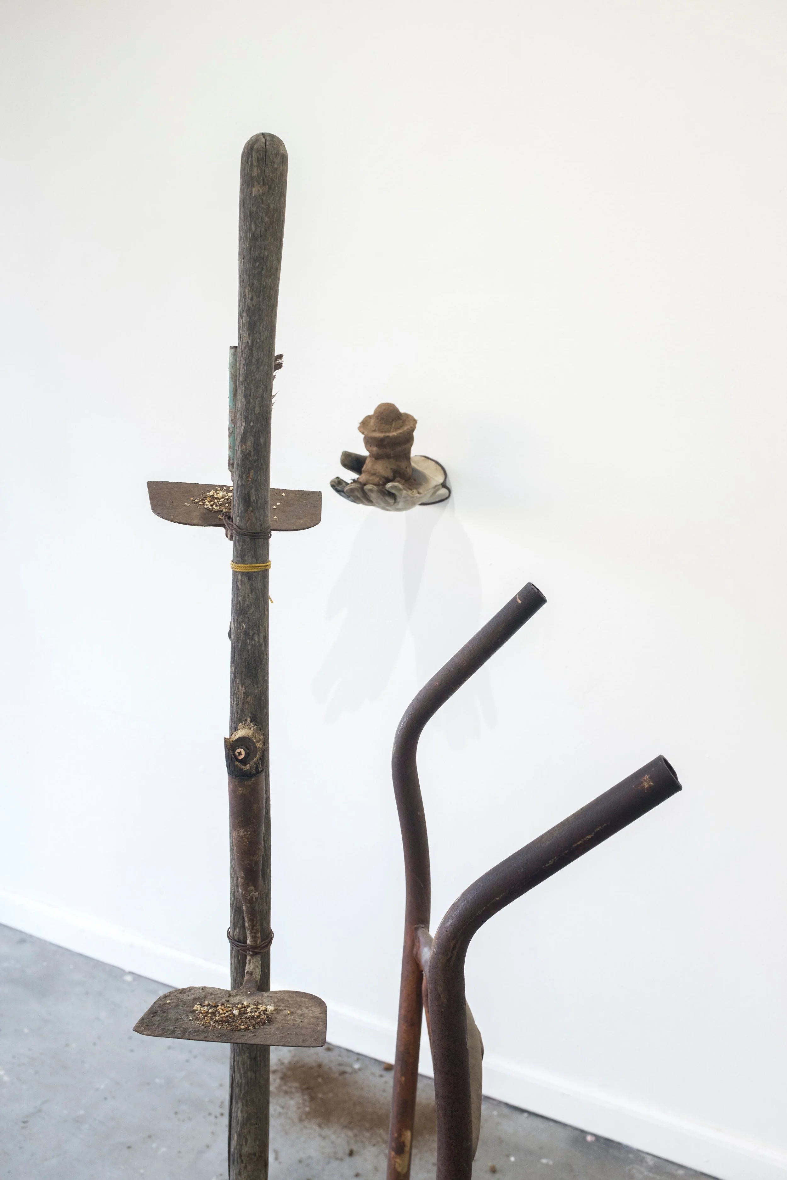 ofrenda (bird feeder) , 2019 Juan’s glove, father’s tools, soil from Southern California, bird seed photo credit: Savannah Wood