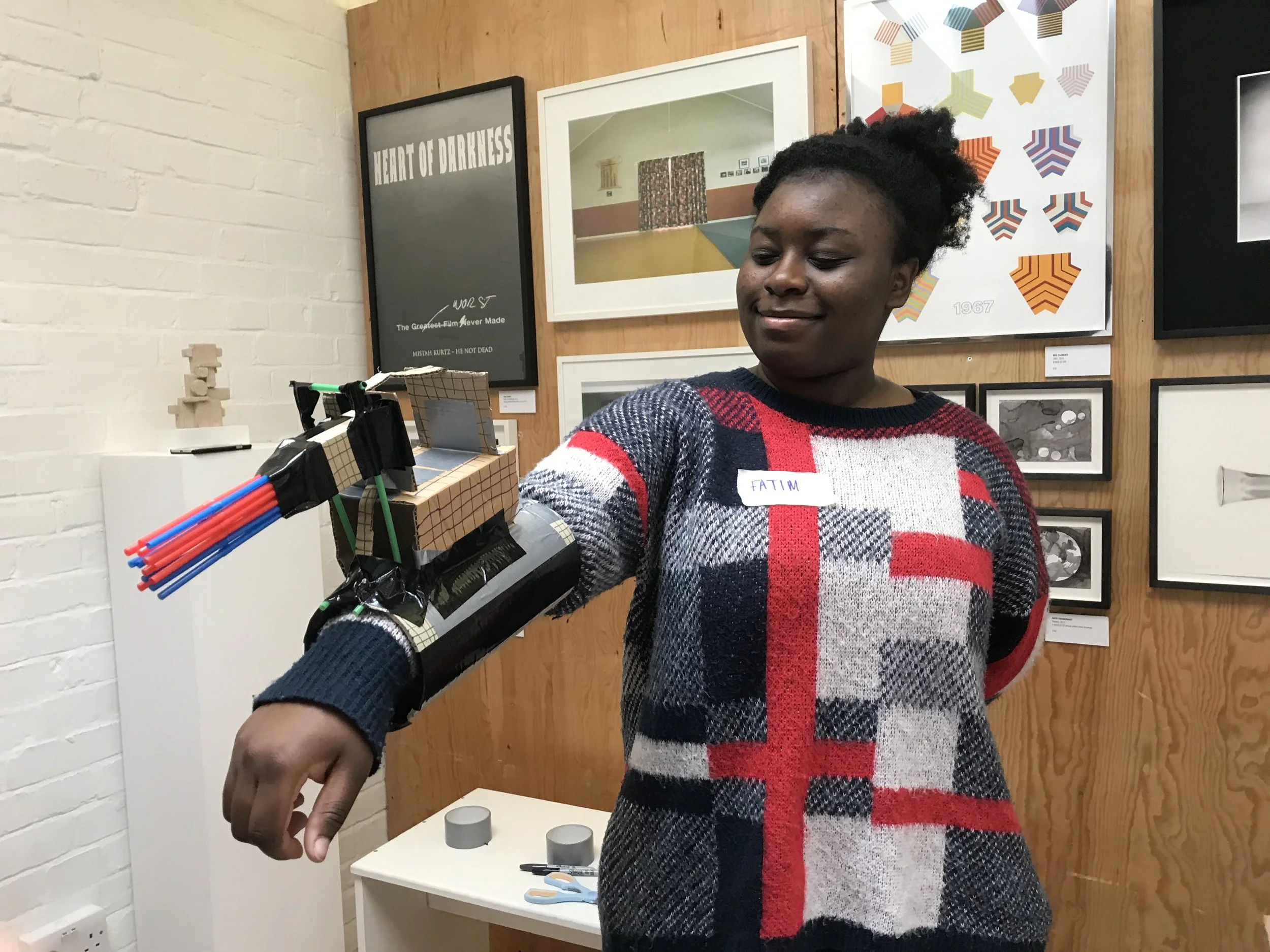 PEER Ambassador Fatim during a workshop with PEER Notices artist Rebecca Moss