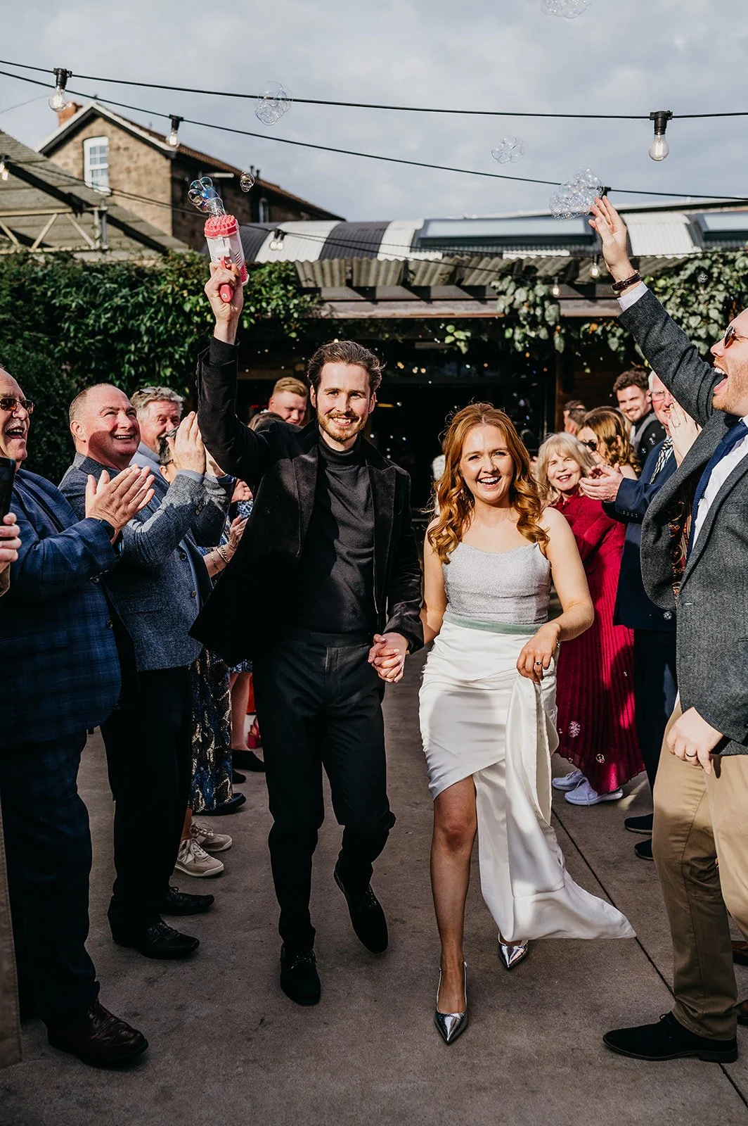 groom and groom with buggle gun at shack revolution