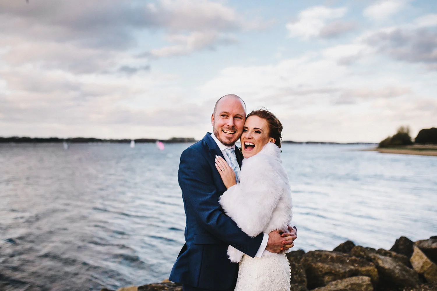 laughing-bride-and-groom-rutland-water.jpg