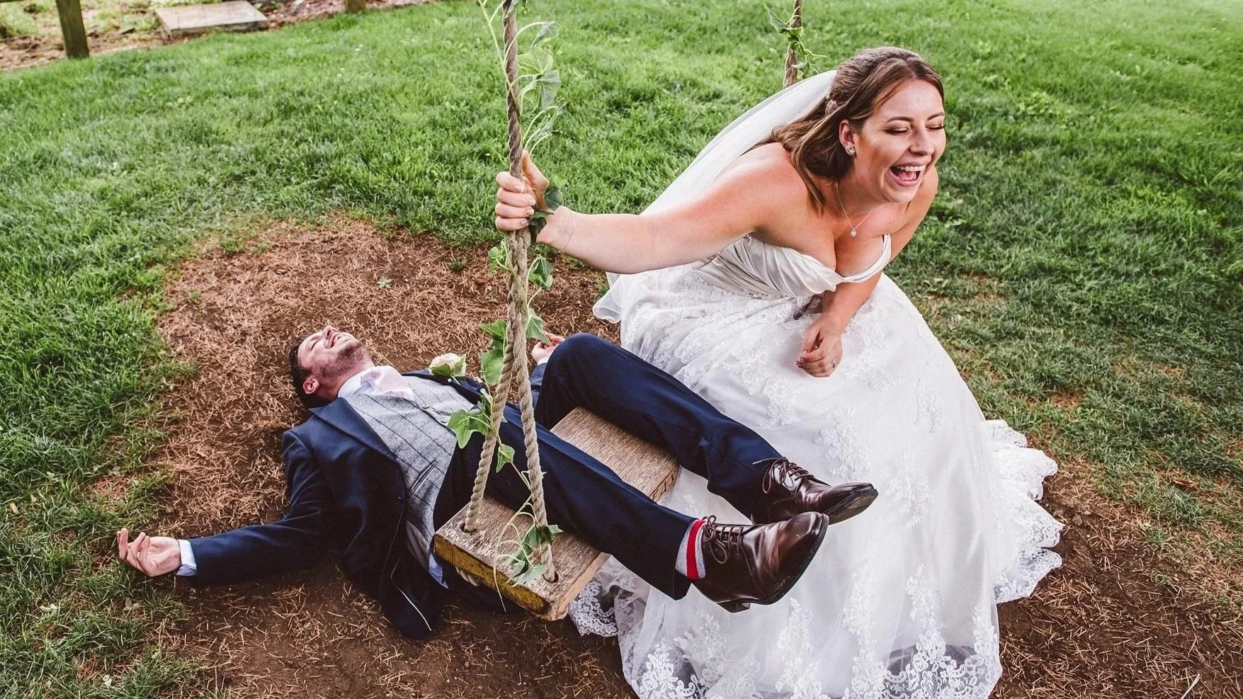 bride%2Band%2Bgroom%2Bplay%2Bon%2Ba%2Bswing.jpg