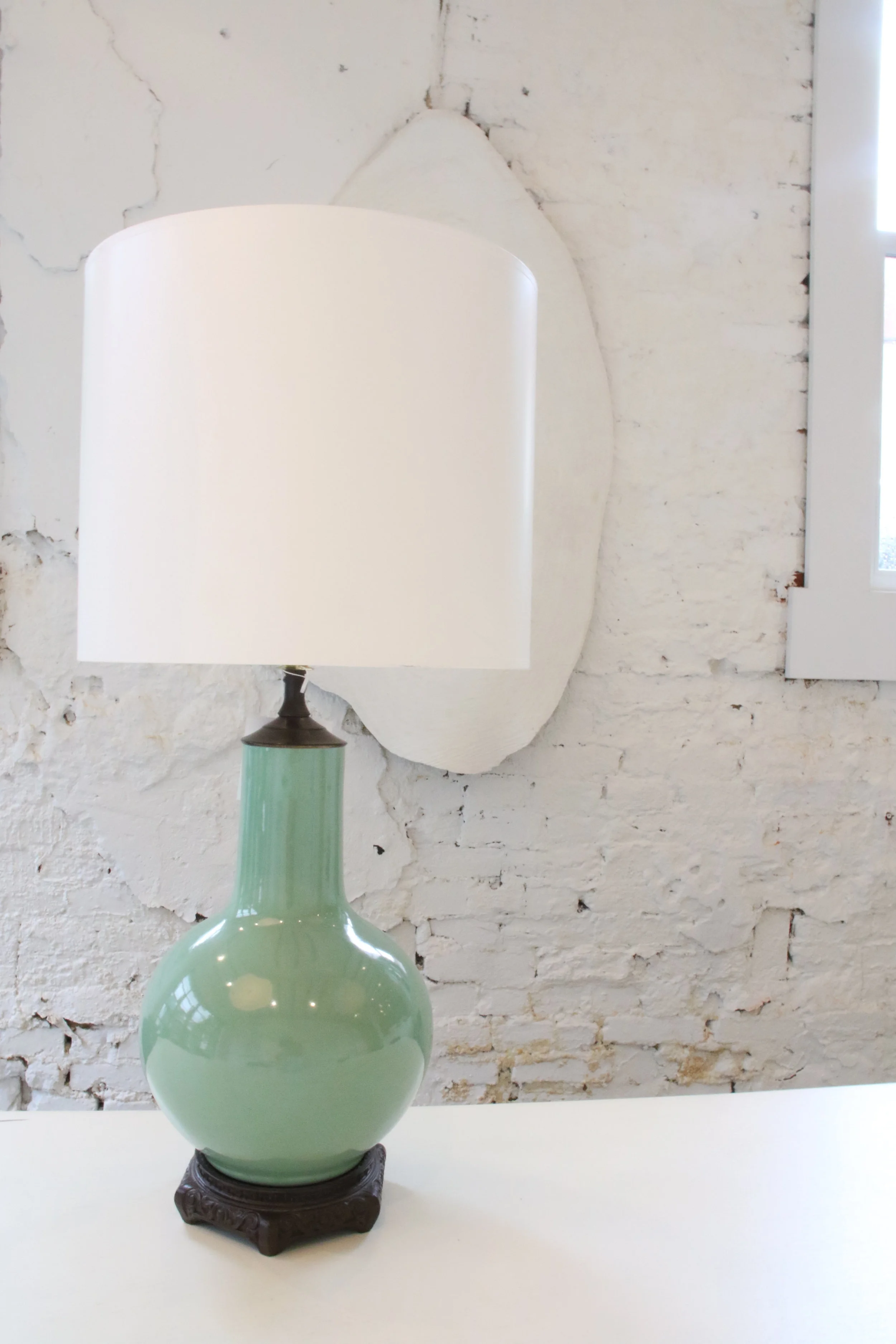 Celadon Ceramic Lamp 25"H x 7" W $1100 To order please call us at 202-234-5926 or email at boutique@darrylcarter.com. Please note pricing excludes taxes and shipping.