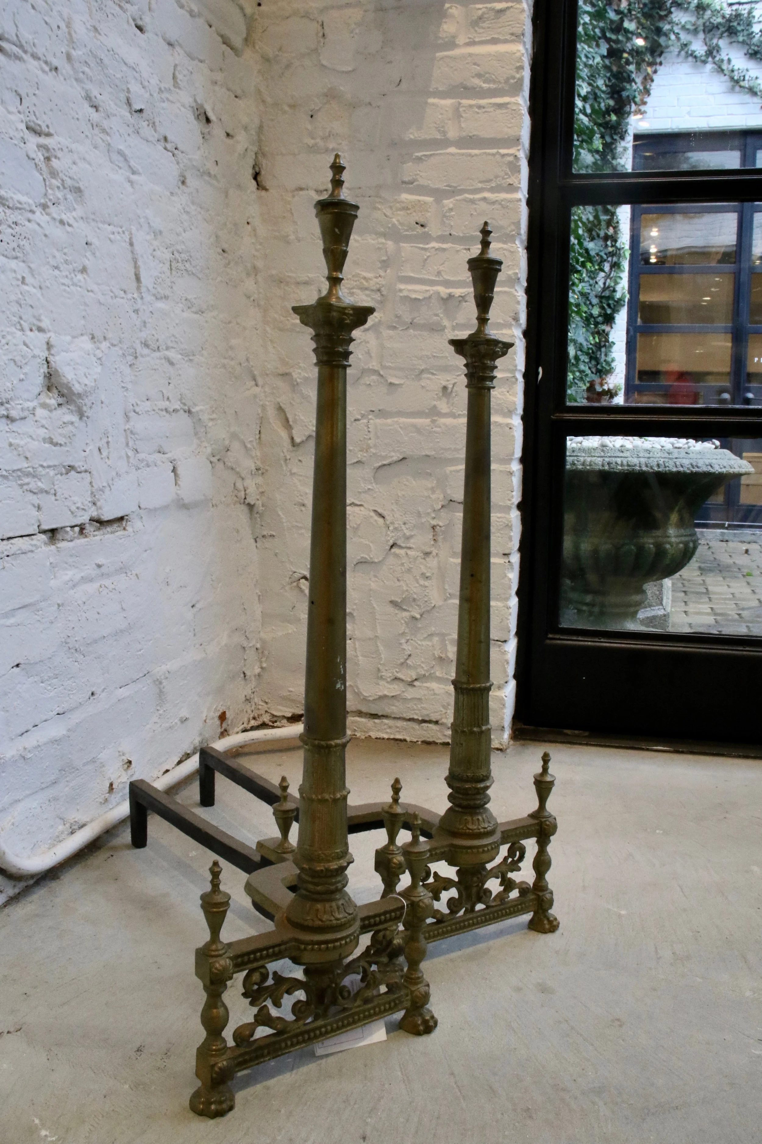 Antique Andirons with Finial Detailing 8.25" L x 20.5" D x 27.5" H $850 To order please call us at 202-234-5926 or email at boutique@darrylcarter.com. Please note pricing excludes taxes and shipping.