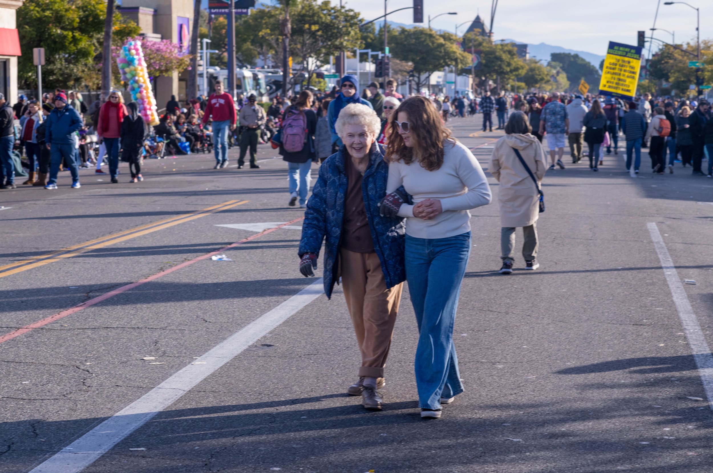  Is that Helen walking down the middle of the boulevard? 