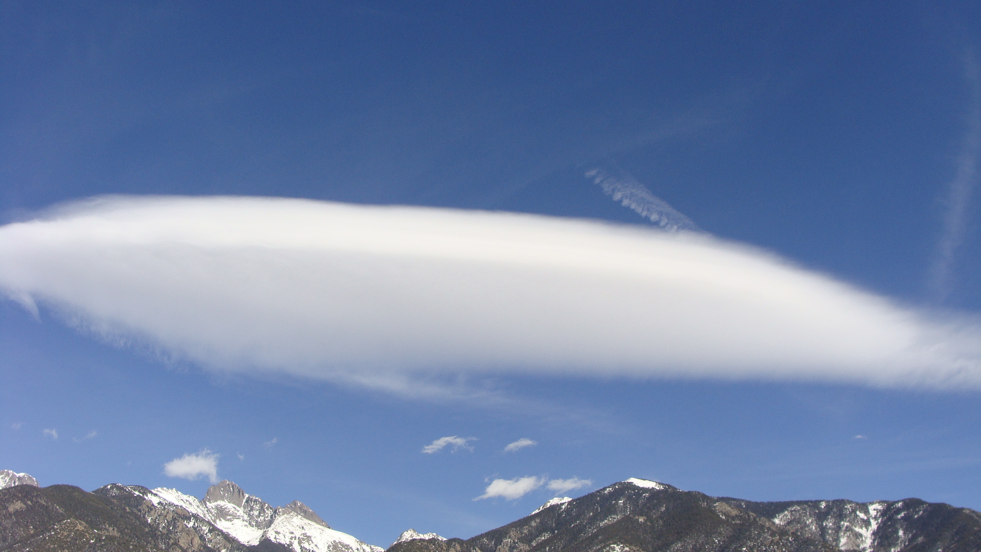 An 'eye' over the Sangre de Cristos reminds me to see my choices. Grateful to live in such inspiring beauty.