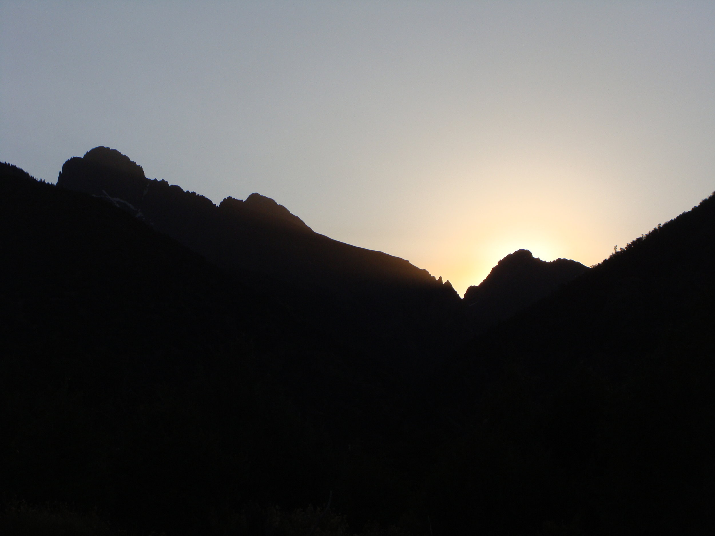 The sun is ready to peek over the peaks.