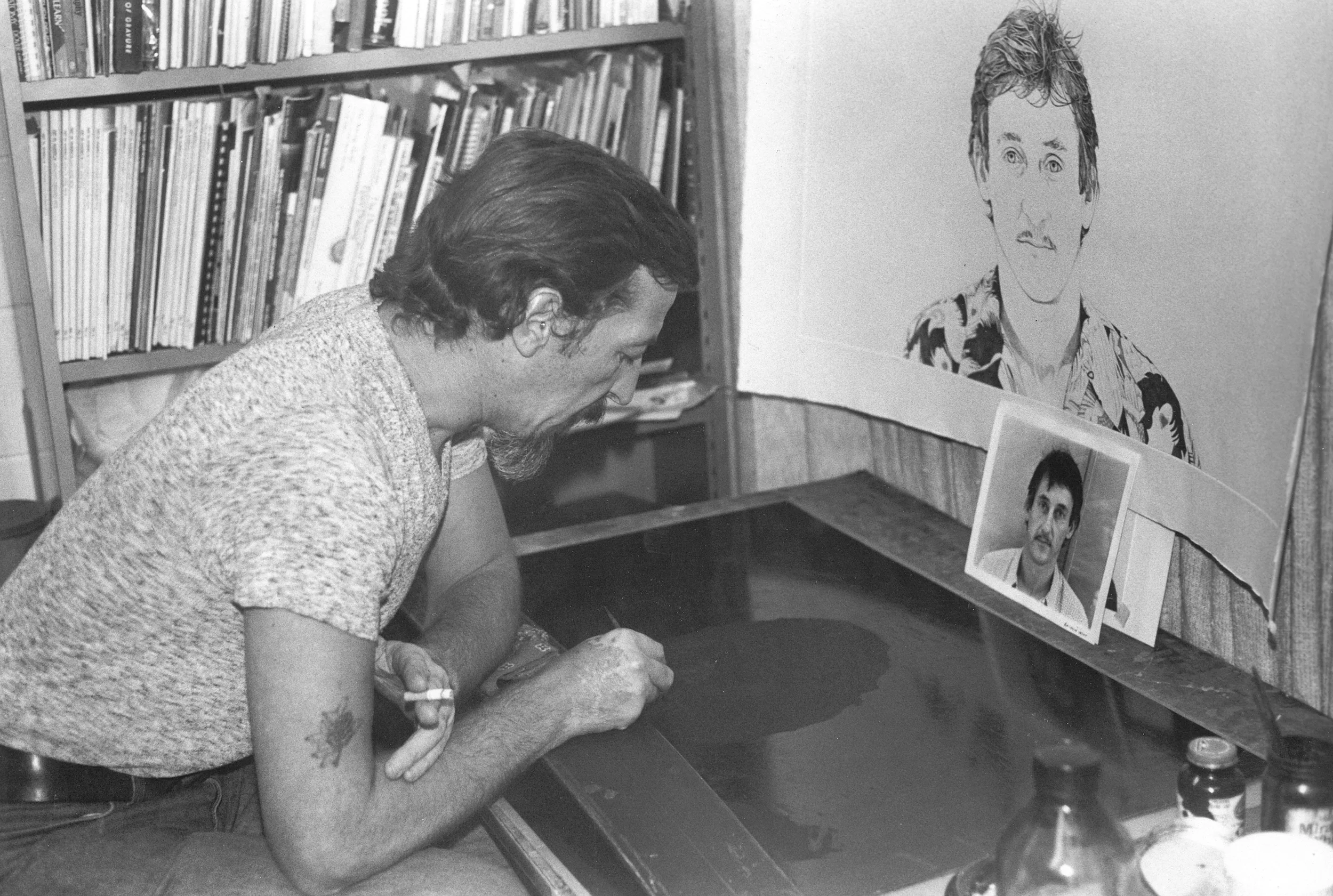 Theo, USF 1979, creating a stipple etched plate of Ed Ruscha.