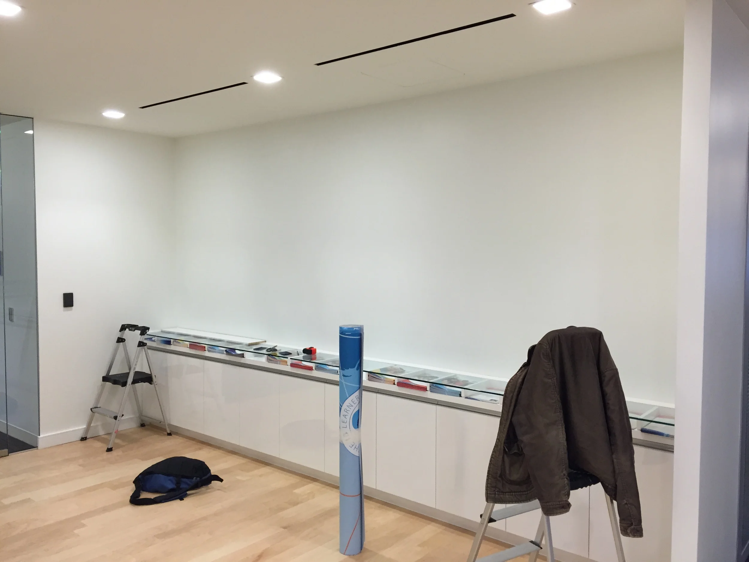 On-site at International Baccalaureate in Bethesda, MD. The wall is prepped and the vinyl is ready to install.