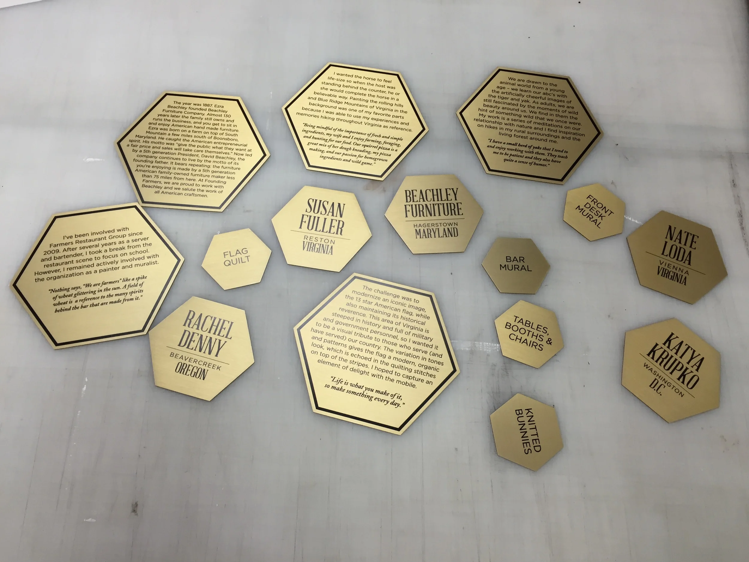 The prints, applied to the brass faces