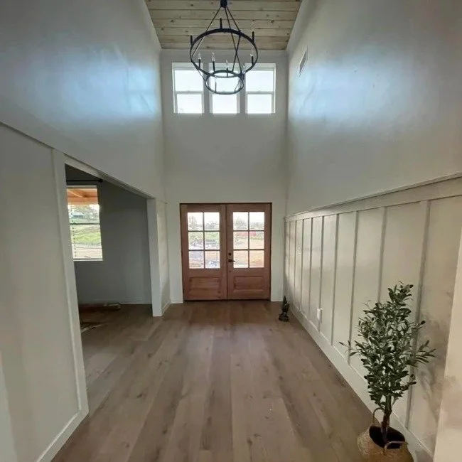 What if we told you that this stunner of an entryway was our customer's DIY project using our @coretecfloors ?
The floors are the perfect fit for this entry, and they look like real wood, but they're worry-free and waterproof vinyl plank. 
FYI - All 