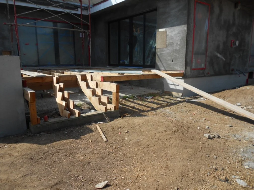 rear deck stairs and bench sitting area.jpg
