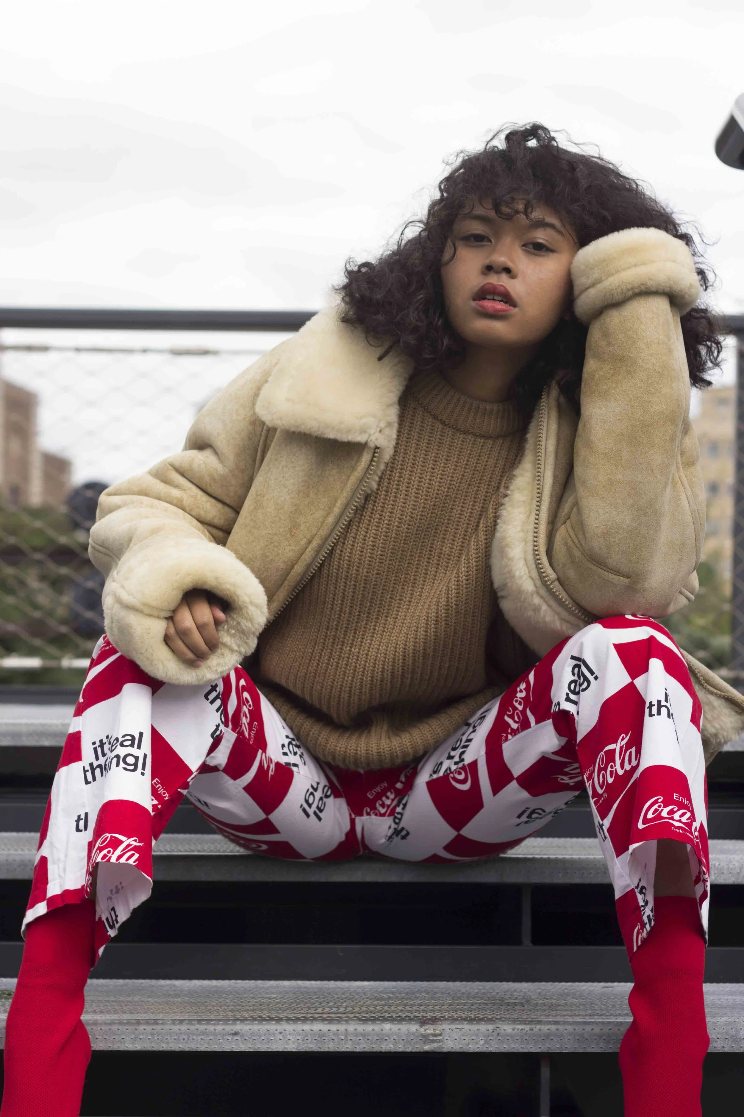 1960s Coca Cola Print Pants with 1990s Shearling Coat and 1960s British Knit