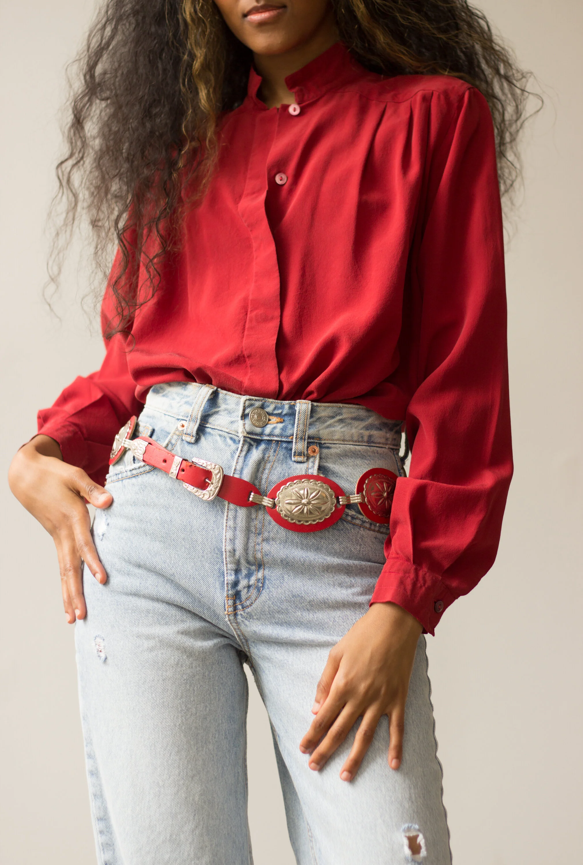 1970s Red Leather and Stamped Silver Concho Belt