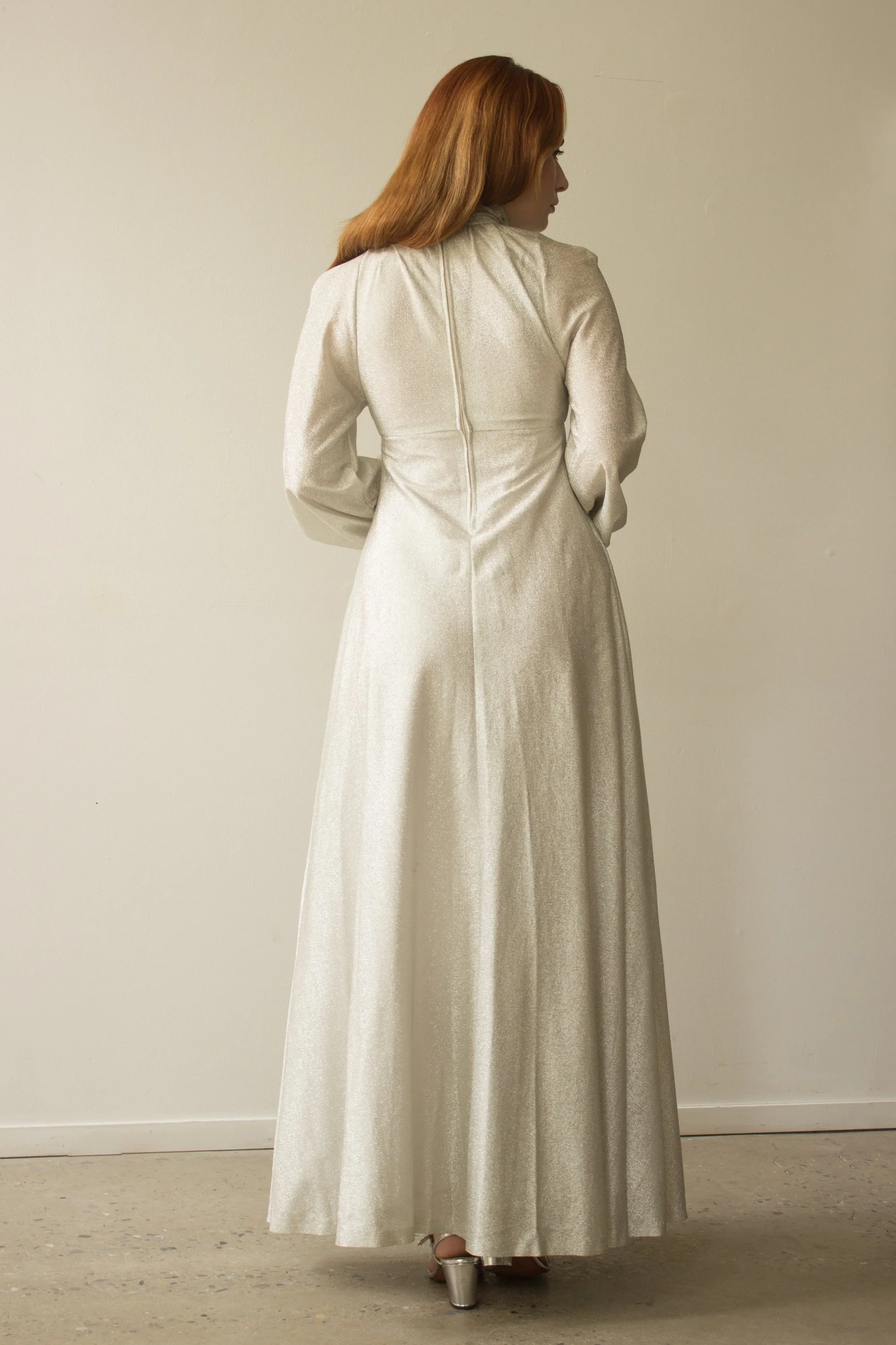 1970s Bright Silver Bishop Sleeve High Collar Gown  Wayward Collection