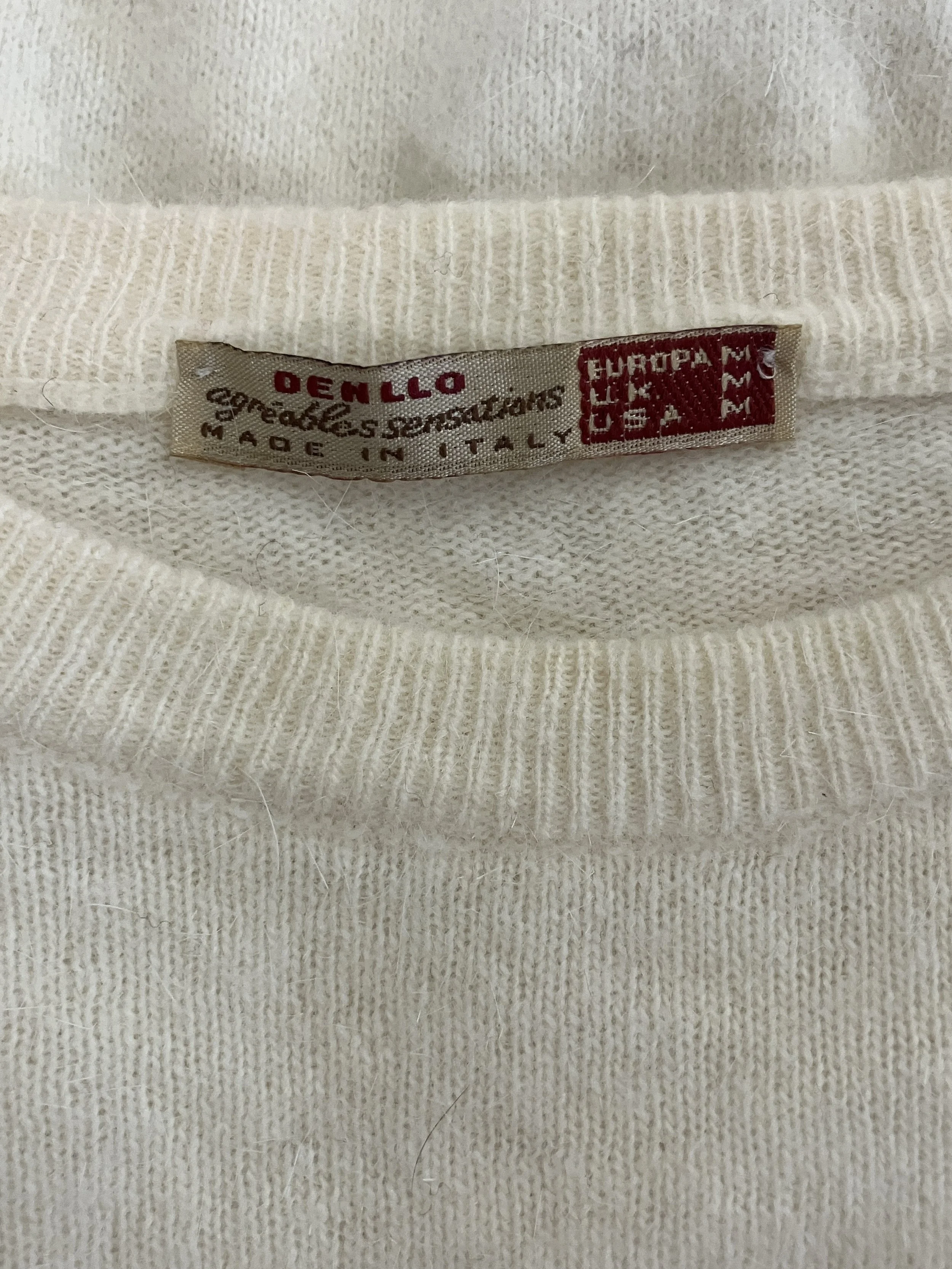 creme sweater tag 1.JPG