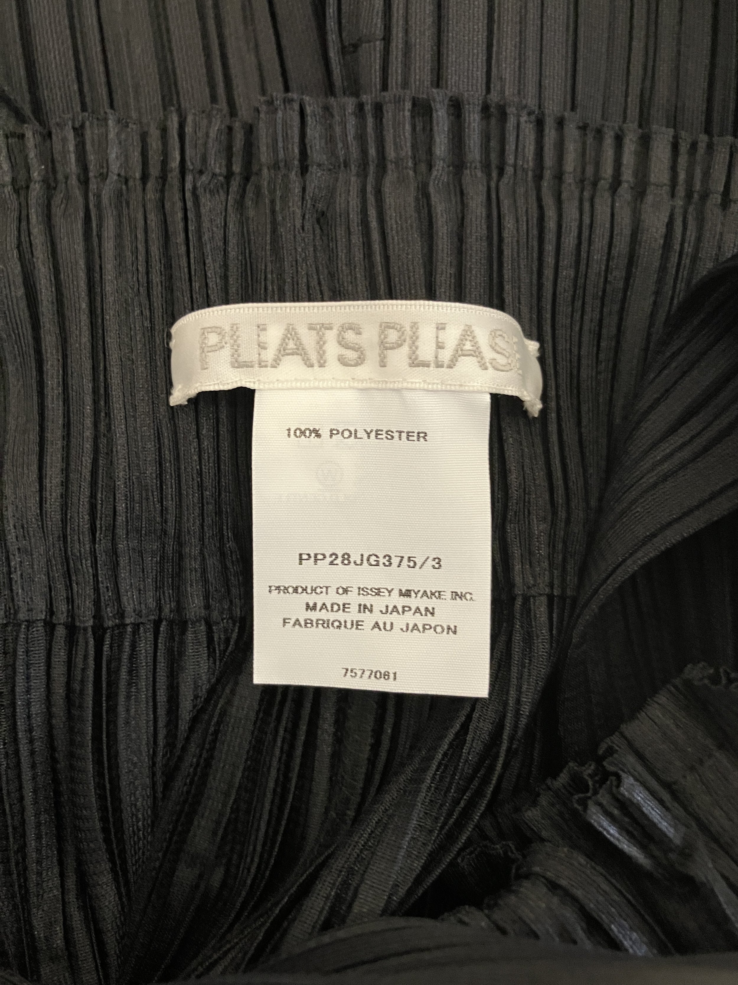 pleats pinafore tag.jpeg