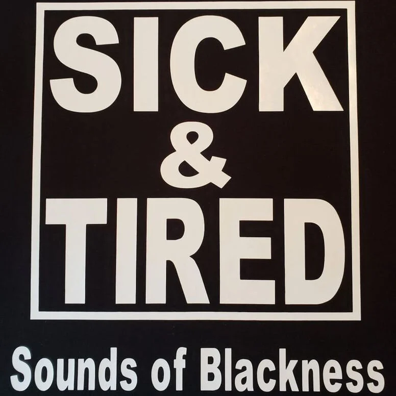 front of Sick & Tired t-shirt