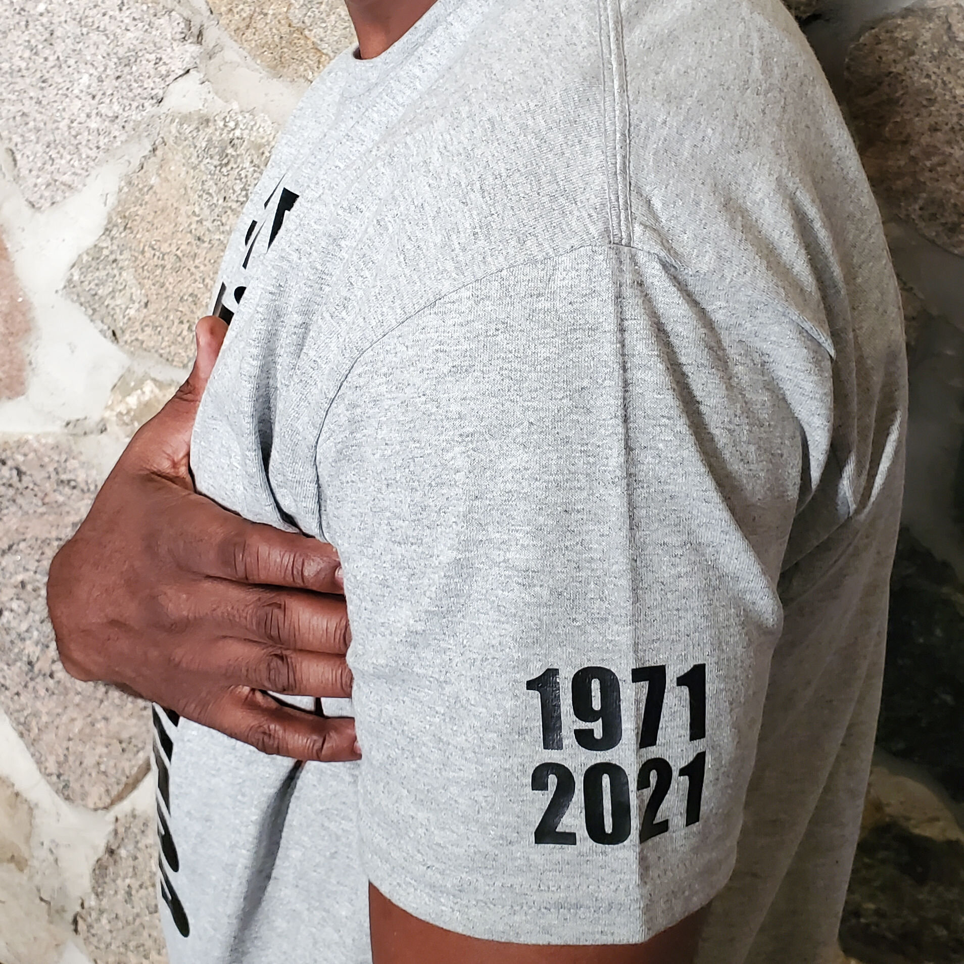 side of 50th Anniversary black letter t-shirt
