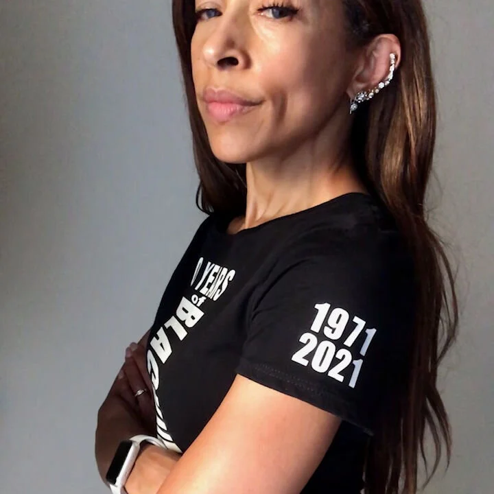 side of 50th Anniversary cropped white letter t-shirt
